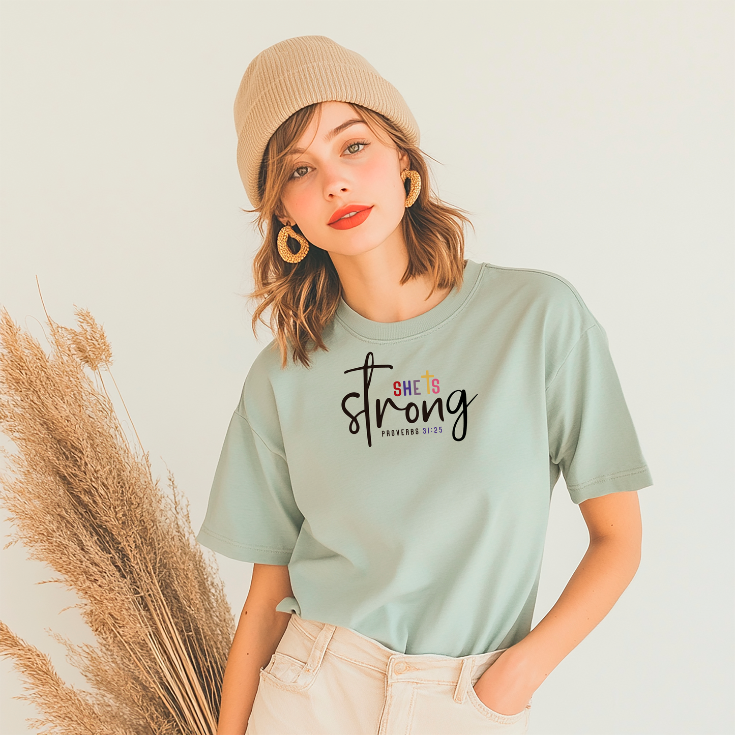 She Is Strong script typography T-shirt | Proverbs 31:25 Christian apparel