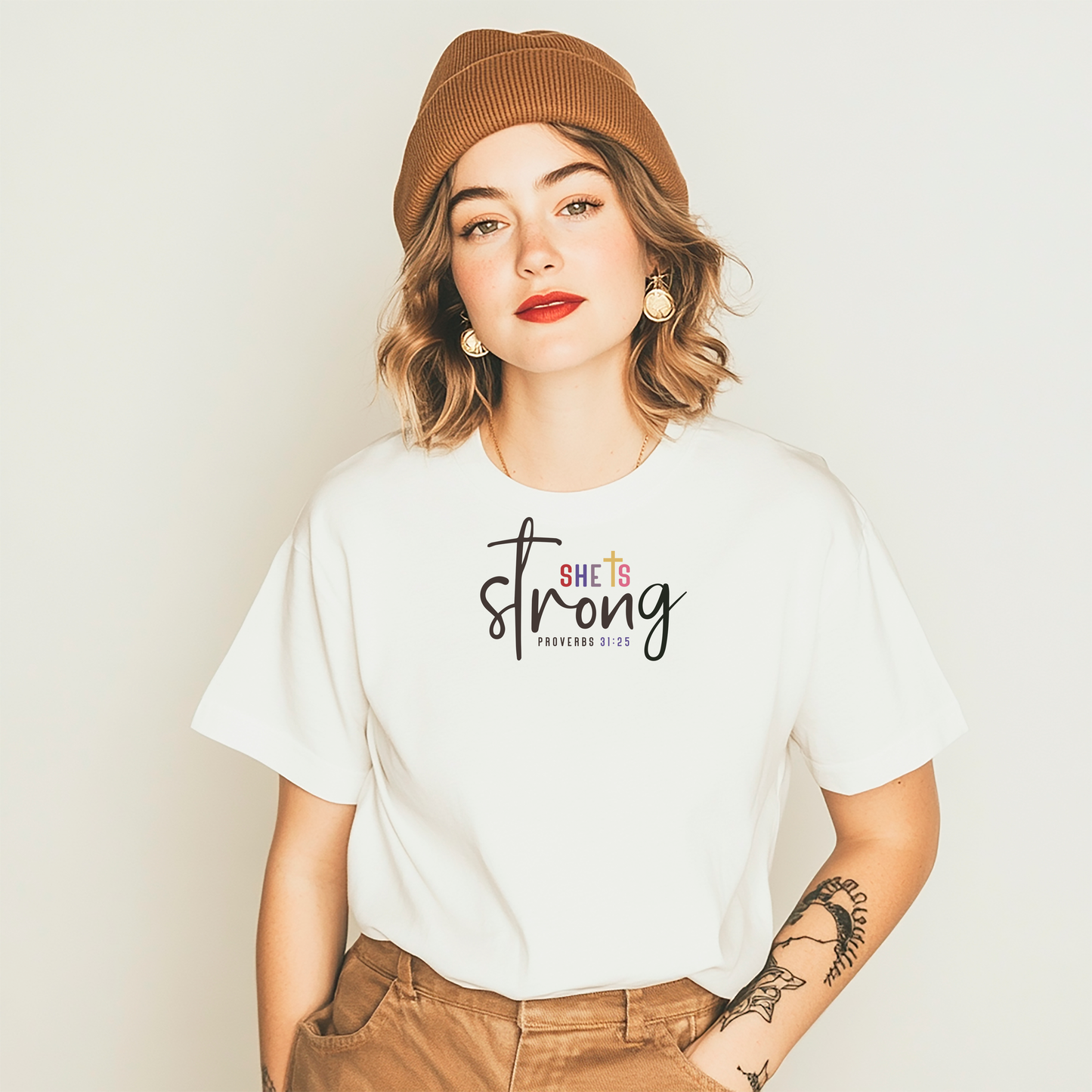 She Is Strong script typography T-shirt | Proverbs 31:25 Christian apparel