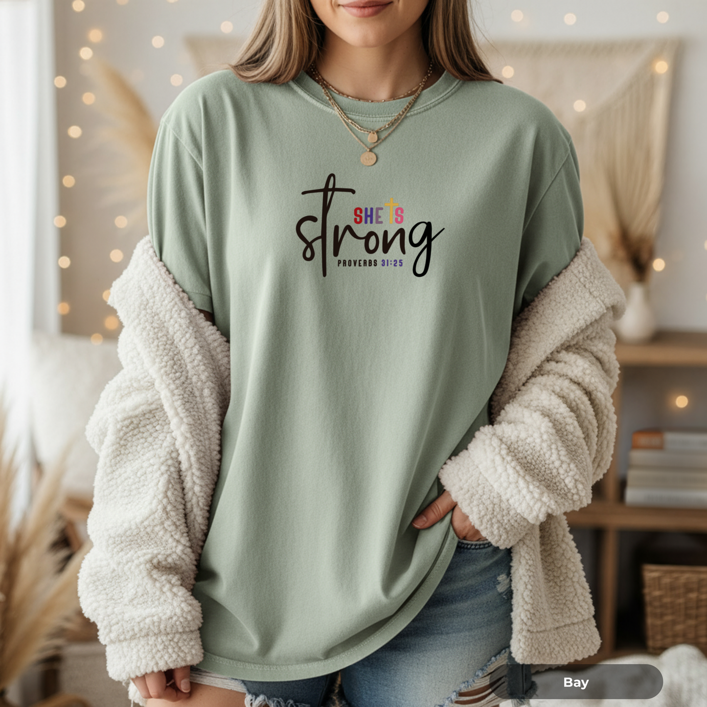 She Is Strong script typography T-shirt | Proverbs 31:25 Christian apparel